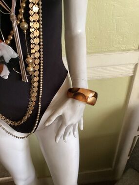 Amber gold brown lucite bangle